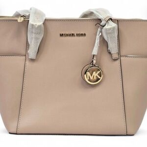 Michael Kors Charlotte Large Top-Zip Tote in the color Powder Blush.